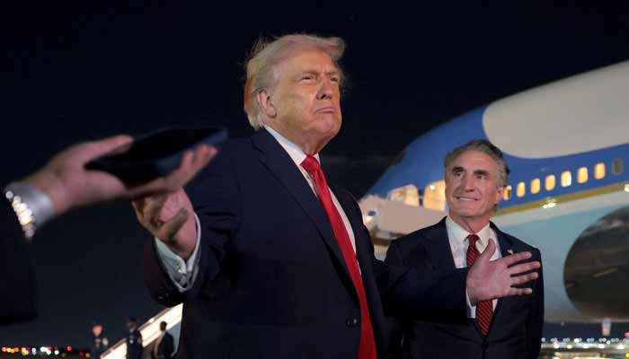 US President Donald Trump talks with reporters as on at Palm Beach International Airport on January 19, 2026 in West Palm Beach, Florida.— AFP/File