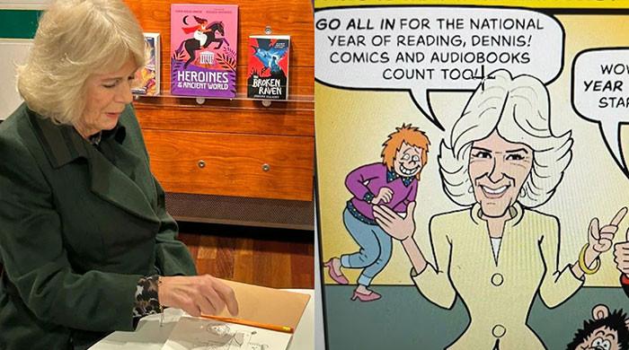 Queen Camilla draws her own cartoon and laughs