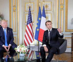 'We don't give in to bullies', Macron says after Trump salvo