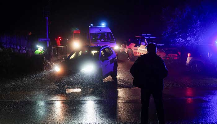 Emergency vehicles arrive at the scene of a commuter train derailment after a containment wall fell on the track due to heavy rain, killing the driver and injuring several people near Barcelona, in Gelida, Spain, January 21, 2026. — Reuters