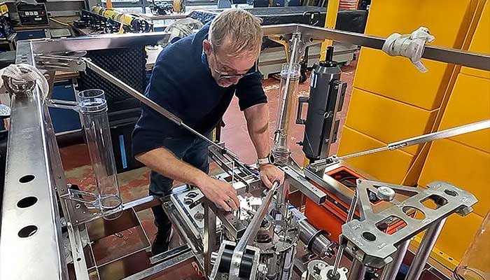 This undated handout picture released by the Scottish Association for Marine Science (SAMS) on January 20, 2026, shows Professor Andrew Sweetman of the Scottish Association for Marine Science (SAMS) working with one of the new landers specially designed to probe how polymetallic nodules could be producing oxygen in the darkest depths of the ocean, at the SAMS in Oban, Scotland. — AFP