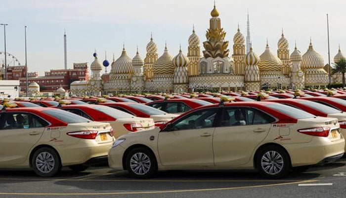 Dubai Taxis that belong to the road transportation authority (RTA), are seen parked. — Reuters