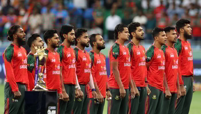 General view of the trophy as the Bangladesh players line up during the national anthems before the India vs Bangladesh match at the Dubai International Cricket Stadium, Dubai, on September 24, 2025. — Reuters