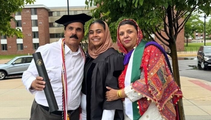 Asif Amin Cheema (left) and her wife celebrating graduation of their daughter Rabia Amin. —File Photo provided by family