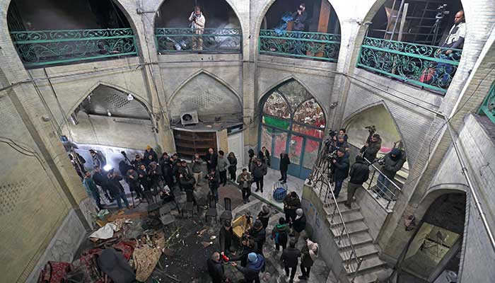 This photograph taken during a tour for foreign media shows media representatives visiting the Al-Aqsa Mosque that was damaged during recent public protests, in Tehran on January 21, 2026. — AFP