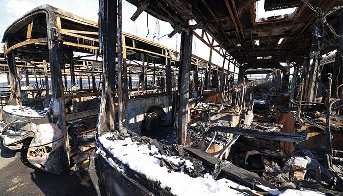 This photograph taken during a tour for foreign media shows the parked buses that were burnt at a depot during recent public protests, in Tehran on January 21, 2026. — AFP