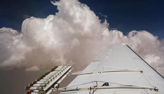 Hygroscopic flares are attached to an aircraft during a cloud seeding flight operated by the National Center of Meteorology, between Al Ain and Al Hayer, in United Arab Emirates. — Reuters/File