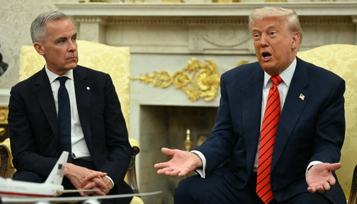 Donald Trump meets with Canadian Prime Minister Mark Carney in the Oval Office of the White House in Washington DC on May 6, 2025. — AFP