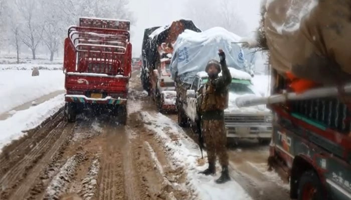 Families evacuate homes along snow-covered roads amid heavy snowfall and freezing cold in Tirah Valley, Khyber Pakhtunkhwa, January 23, 2026. — Reporter