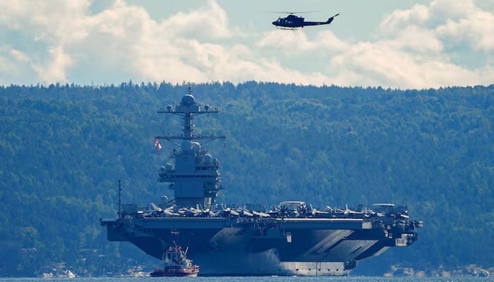 The worlds largest warship, US aircraft carrier USS Gerald R. Ford, on its way out of the Oslofjord at Nesodden and Bygdoy, Norway, September 17, 2025. — Reuters