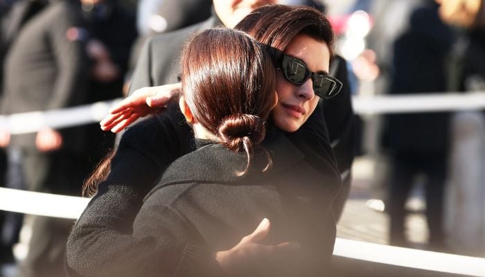 Valentino’s ‘muse’ Anne Hathaway leads mourners at star-studded funeral
