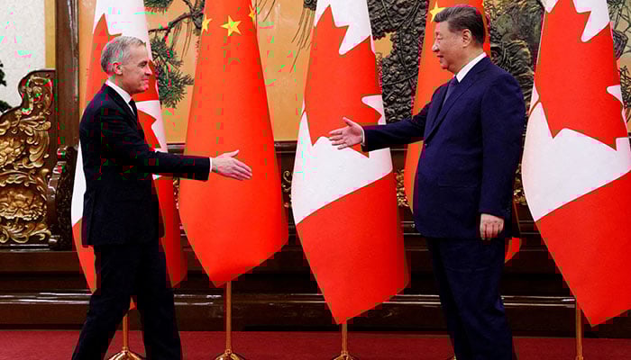 Canadian Prime Minister Mark Carney meets with President of China Xi Jinping at the Great Hall of the People in Beijing, China on Friday, Jan. 16, 2026. — Reuters