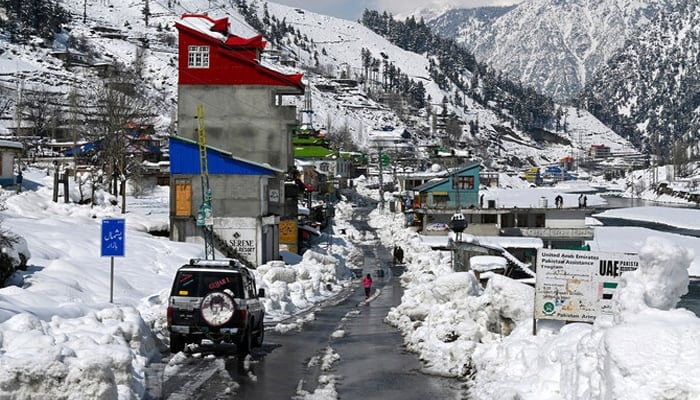 A view of snow laden Pishmal Bazar in Kalam on March 4, 2024. — AFP