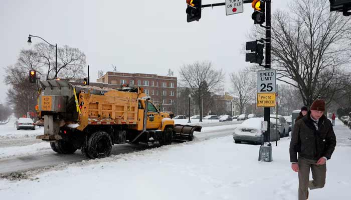 A snowplow truck works on the road as a major winter storm spreads across a large swath of the United States, in Washington, DC, US, January 25, 2026.— Reuters