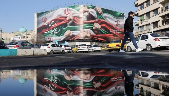 A billboard with a picture of Irans flag, on a building in Tehran, Iran, January 24, 2026. — Reuters