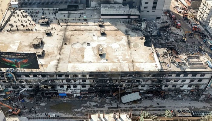 An aerial view shows the charred remains of a Gul Plaza shopping mall after a massive fire in Karachi on January 21, 2026. — AFP
