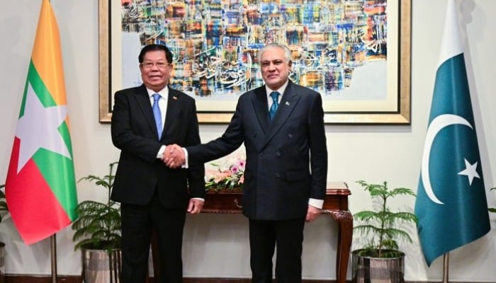 DPM and FM Senator Mohammad Ishaq Dar shakes hands with Myanmar’s FM Than Swe. — APP