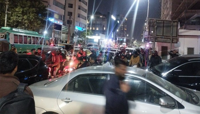 This photo shows long queues of vehicles and motorcycles on II Chundrigar Road, Karachi, January 26, 2026. — Geo.tv