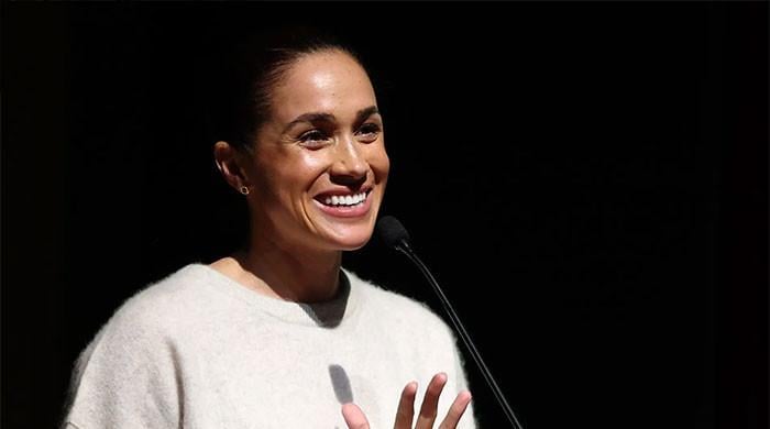 Meghan Marke speaks out as Harry forgets legal woes for cookie night