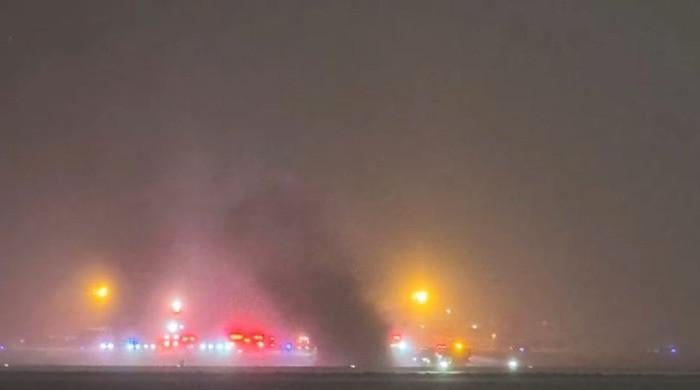 Private jet crashes in flames at Maine airport with eight aboard