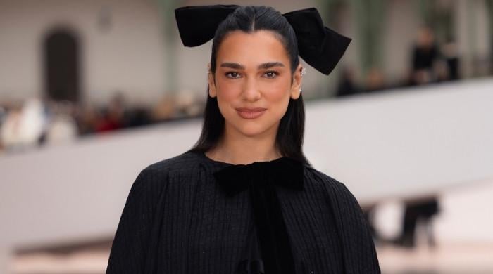 Dua Lipa accidentally finds new way to style her shirts