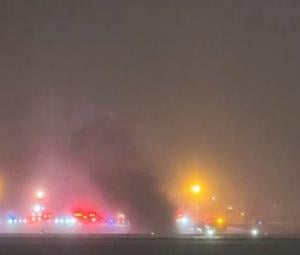 Private jet crashes in flames at Maine airport with eight aboard