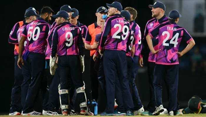 Scotland players celebrate a dismissal during their ICC Mens T20 World Cup match against Australia at the Daren Sammy National Cricket Stadium in Gros Islet on June 15, 2024. — ICC