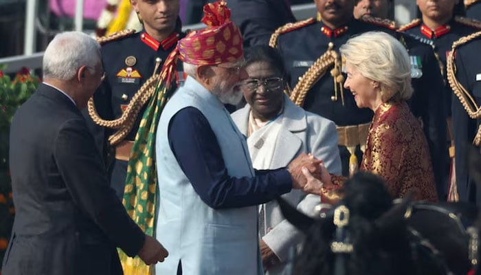 Indias Prime Minister Narendra Modi greets European Commission President Ursula von der Leyen, next to Indias President Droupadi Murmu, as they arrive to attend the Republic Day parade in New Delhi, India, January 26, 2026. — Reuters