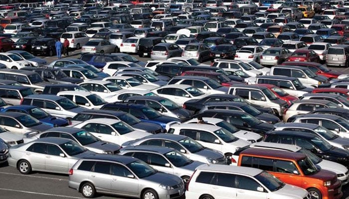 A representational image showing a large number of vehicles parked at a site. — AFP/File