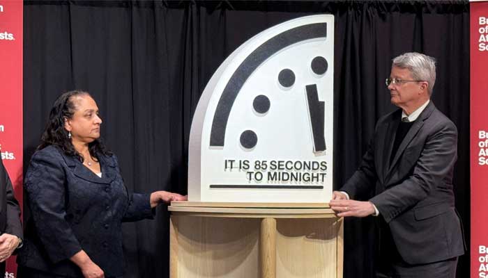 Jon Wolfsthal, director of global risk at the Federation of American Scientists (FAS), Asha George, executive director of the Bipartisan Commission on Biodefense, and Steve Fetter, professor of public policy and former dean at the University of Maryland, reveal the location of the minute hand on its Doomsday Clock, indicating what world developments mean for the perceived likelihood of nuclear catastrophe, during a town-hall in Washington, DC, US, January 23, 2026. — Reuters