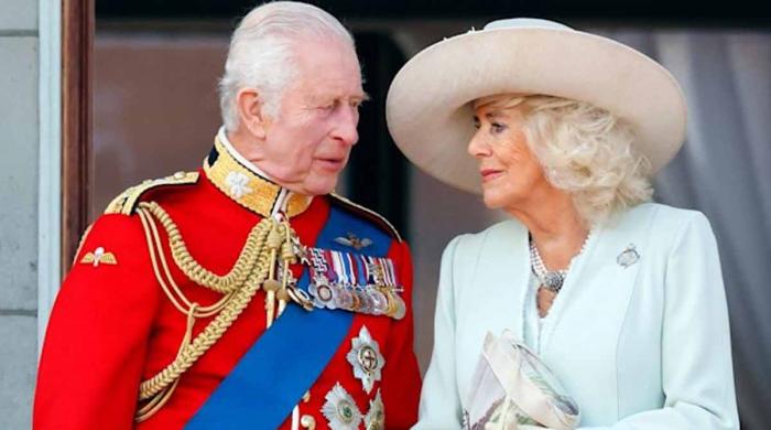 King Charles, Queen Camilla return to Buckingham Palace with tears