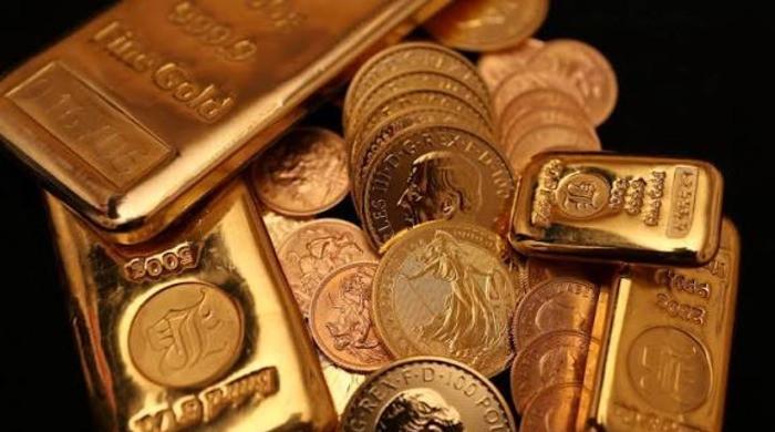 Gold climbs to record high above $5,300 as dollar slips