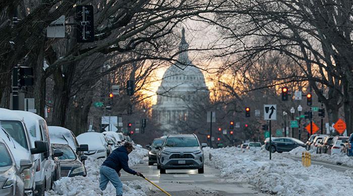 Winter storm kills dozens as cold lingers in central and eastern US