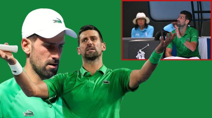 Novak Djokovic argues with umpire over warning at Australian Open