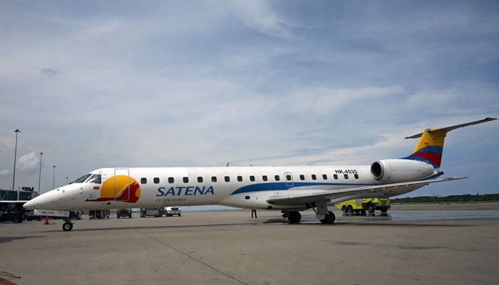 The image shows a Satena Airlines aircraft covering the route Bogota-Caracas, pictured upon arrival at Simon Bolivar International Airport in Venezuela, on November 9, 2022. — AFP