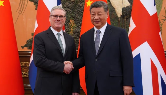 Britains Prime Minister Keir Starmer shakes hands with Chinese President Xi Jinping ahead of a bilateral meeting during his visit to China, in Beijing, China, January 29, 2026. — Reuters
