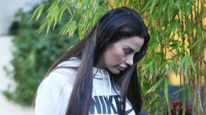 Katie Price looks downcast as new marriage faces dark allegations