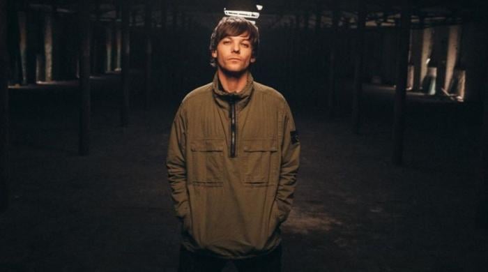 Louis Tomlinson explains confusing part of singing One Direction songs