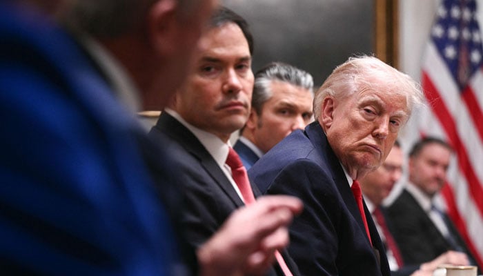 US President Donald Trump listens during a cabinet meeting in the Cabinet Room of the White House in Washington, DC, on January 29, 2026. — AFP