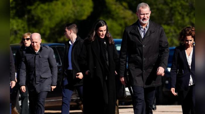 King Felipe, Queen Letizia lead mass tribute in touching moment of tragedy  