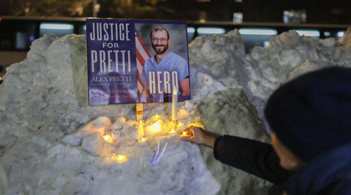 Trump brands Minneapolis nurse shot dead by federal agents an 'agitator'