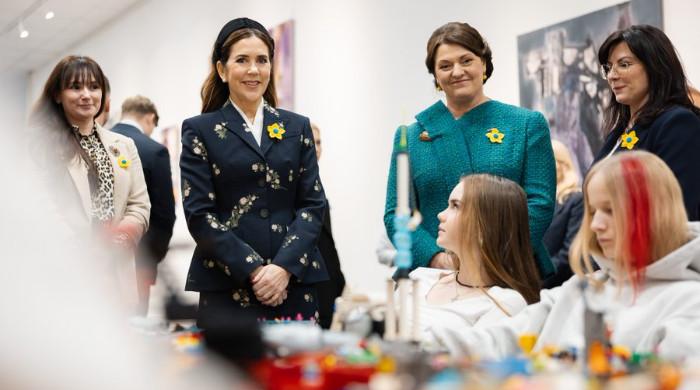 Queen Mary rejoices in cheering moments during special visit