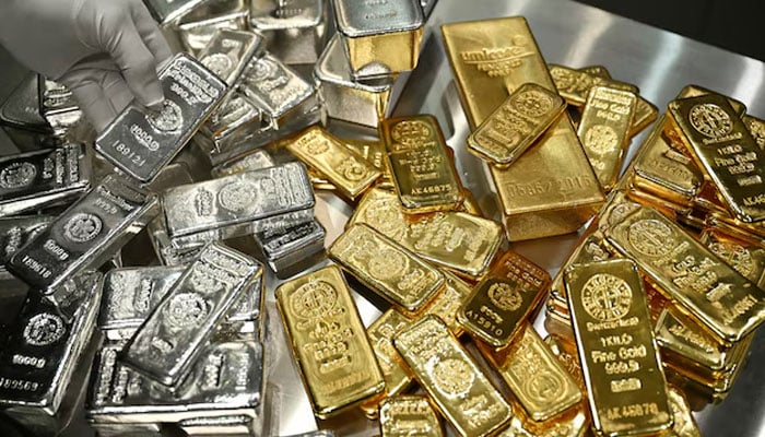 Gold and silver bars are stacked in the safe deposit boxes room of the Pro Aurum gold house in Munich, Germany on January 10, 2025. — Reuters