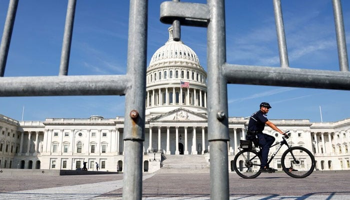 A Capitol Police officer patrols the east front of the US Capitol in Washington. — Reuters/File