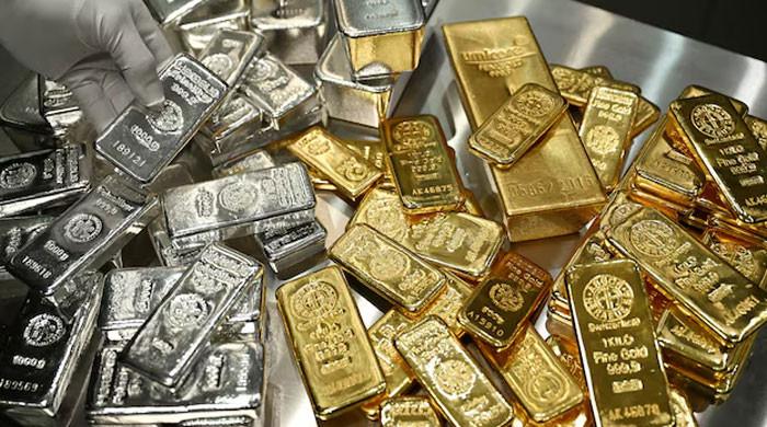 Gold, silver prices tumble as investors soothed by Trump Fed pick