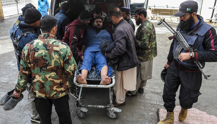 Security personnel shift an injured man at a hospital in Quetta on January 31, 2026, following an attack by terrorists. — AFP