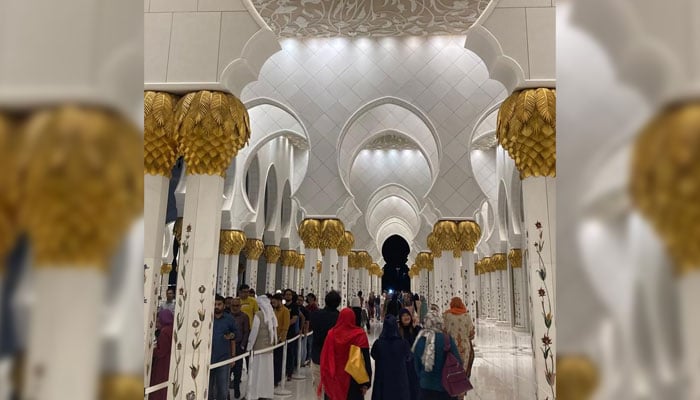 People visit UAEs Sheikh Zayed Grand Mosque. — Reporter