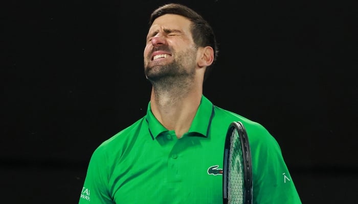 Djokovic hints at retirement as time seeps away on history bid 10 Serbias Novak Djokovic reacts after a point against Spains Carlos Alcaraz during their mens singles final match on day fifteen of the Australian Open tennis tournament in Melbourne on February 1, 2026. — AFP