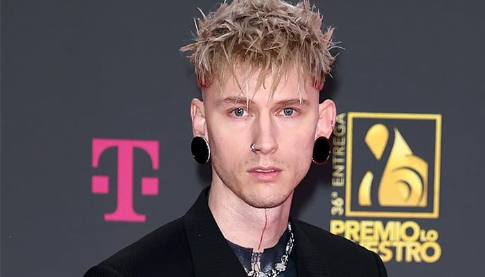 Machine Gun Kelly flaunts new ink at Clive Davis pre-Grammys party