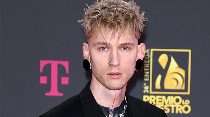 Machine Gun Kelly flaunts new ink at Clive Davis pre-Grammys party